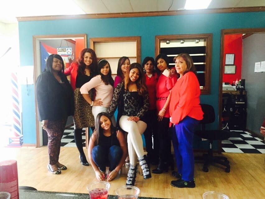 Act 1 group portrait inside a salon with turquoise walls
