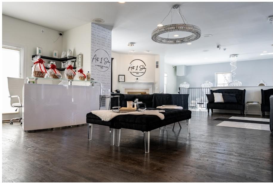 The welcoming reception and lounge inside Act 1 Salon & Spa