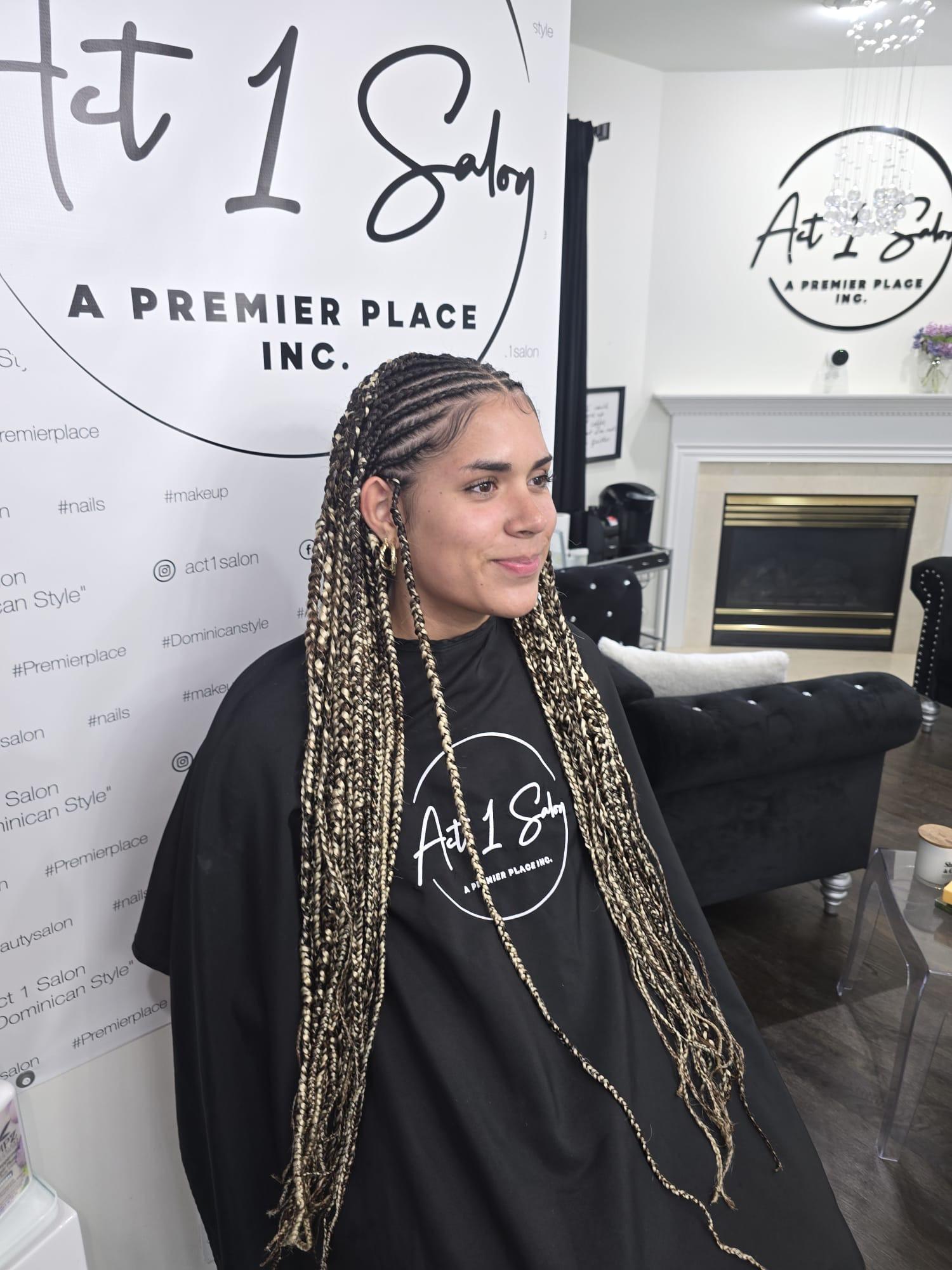 Braids and natural hair work photographed at Act 1 Salon & Spa